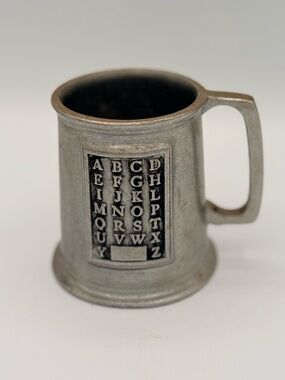 Vintage Wilton Armetale pewter child's mug with embossed alphabet.